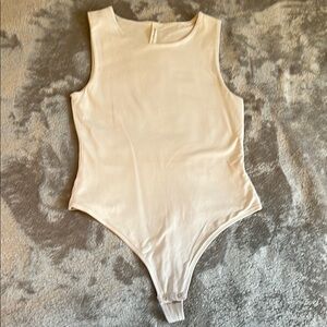 Babaton Cream Bodysuit with High Neckline and thonged cut
